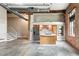 Kitchen and Living space featuring stainless steel appliances and a stairway at 350 Peters Sw St # 6, Atlanta, GA 30313