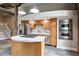 Bright kitchen with stainless appliances, island cooktop, and sleek white countertops at 350 Peters Sw St # 6, Atlanta, GA 30313