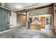 Kitchen with stainless steel appliances with a stairway and entrance to a room at 350 Peters Sw St # 6, Atlanta, GA 30313