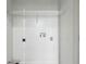 Bright laundry room showcasing hookups and wire rack shelving for optimal organization and convenience at 350 Peters Sw St # 6, Atlanta, GA 30313
