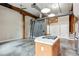 Spacious living area with island cooktop, exposed beams, and ladder to loft area at 350 Peters Sw St # 6, Atlanta, GA 30313