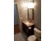 Cozy bathroom features a granite countertop and new fixtures at 3416 N Cook Rd, Powder Springs, GA 30127