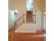 Inviting entryway with wood floors and staircase leading to the upper level at 3416 N Cook Rd, Powder Springs, GA 30127