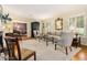 Bright living room featuring hardwood floors, neutral colors, and a view into the dining room at 825 Loridans Ne Cir, Atlanta, GA 30342