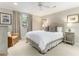 Serene main bedroom with neutral decor, carpeted floor, and ample natural light at 825 Loridans Ne Cir, Atlanta, GA 30342