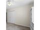 Spacious bedroom with a closet and a built-in bookshelf, providing storage and organization at 832 Wyntuck Nw Dr, Kennesaw, GA 30152