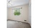 Roomy bedroom with ceiling fan, a window, and plenty of storage at 832 Wyntuck Nw Dr, Kennesaw, GA 30152