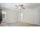 Bedroom featuring a ceiling fan and an en-suite bathroom at 832 Wyntuck Nw Dr, Kennesaw, GA 30152