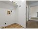 A simple laundry room setup with tile floors and basic utility connections at 832 Wyntuck Nw Dr, Kennesaw, GA 30152