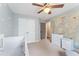 Charming bedroom features a decorative world map and stylish white dresser at 109 J O Simmons Path, Douglasville, GA 30134