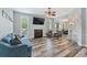 Spacious open-concept living room featuring a fireplace and modern flooring at 109 J O Simmons Path, Douglasville, GA 30134