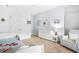 Charming bedroom with a twin bed, a dresser, and a comfortable chair at 2292 W Village Junction Se Way, Smyrna, GA 30080
