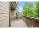 Outdoor deck featuring a glass top table and chairs at 2292 W Village Junction Se Way, Smyrna, GA 30080