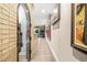 Stylish hallway with brick accents, leading to a recreation area at 2292 W Village Junction Se Way, Smyrna, GA 30080