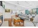 Open concept kitchen, dining and living area with fireplace and plenty of natural light at 2292 W Village Junction Se Way, Smyrna, GA 30080