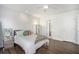 Bedroom with a ceiling fan, wood laminate floors, and an ensuite bathroom at 27 Sycamore Sta, Decatur, GA 30030