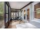 Comfortable screened-in porch with seating, ideal for enjoying the outdoors at 27 Sycamore Sta, Decatur, GA 30030