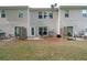 Backyard featuring a grill, green grass and patio area at 2826 Snapfinger Mnr, Decatur, GA 30035