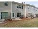 Townhome backyard featuring a small patio and fenced yard at 2826 Snapfinger Mnr, Decatur, GA 30035