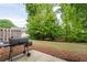 Backyard with grill and green grass at 2826 Snapfinger Mnr, Decatur, GA 30035