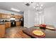 Traditional eat-in kitchen with wood cabinets, black appliances, and decorative table settings at 2826 Snapfinger Mnr, Decatur, GA 30035