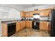 Functional kitchen featuring wooden cabinetry and essential appliances at 2826 Snapfinger Mnr, Decatur, GA 30035