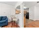 View of kitchen from an open floor plan, enhanced by decorative columns at 2826 Snapfinger Mnr, Decatur, GA 30035