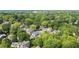 Green aerial view highlighting a neighborhood with well-maintained homes and mature trees at 425 Harold Ne Ave, Atlanta, GA 30307