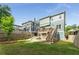 The backyard features the back of two homes with upper level decks at 425 Harold Ne Ave, Atlanta, GA 30307