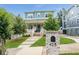 Two-story home with a charming front porch, manicured lawn, and modern brick mailbox at 425 Harold Ne Ave, Atlanta, GA 30307