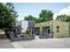Inviting restaurant featuring outdoor seating, a fountain, and modern architecture at 425 Harold Ne Ave, Atlanta, GA 30307