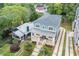 Beautiful two-story house featuring a welcoming porch, manicured lawn, and modern driveway at 425 Harold Ne Ave, Atlanta, GA 30307