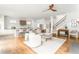 Open concept living room with a modern kitchen, staircase, and spacious living area at 425 Harold Ne Ave, Atlanta, GA 30307