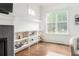 Bright living room with hardwood floors, built-in shelves, and a view of the outdoors at 425 Harold Ne Ave, Atlanta, GA 30307
