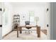 Bright and airy home office with hardwood floors, a desk, and natural light at 425 Harold Ne Ave, Atlanta, GA 30307