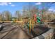 Community playground with swings, slides, and climbing structure for recreation and enjoyment at 425 Harold Ne Ave, Atlanta, GA 30307