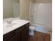 A bathroom featuring a modern vanity with a sleek white countertop and dark wood cabinetry at 6069 Semaphore Rdg, Rex, GA 30273