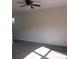 Bedroom featuring carpet, a ceiling fan, and large window at 6069 Semaphore Rdg, Rex, GA 30273