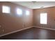 A bright living space with three windows offering lots of natural sunlight at 6069 Semaphore Rdg, Rex, GA 30273