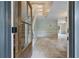 Inviting foyer with tile flooring and a view of the staircase and adjacent living spaces at 1007 Natalie Se Ln, Smyrna, GA 30082