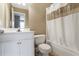 Bathroom featuring a tub and shower combination with a white shower curtain at 1593 Fredricksberg Dr, Loganville, GA 30052