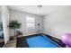 Bright and spacious fitness room/gym area with window and plenty of natural light at 2103 Blue Creek Ct, Conley, GA 30288