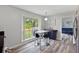 Bright eat-in kitchen with natural light, modern finishes, and breakfast bar seating at 2103 Blue Creek Ct, Conley, GA 30288