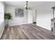 Spacious living room with lots of light, hardwood floors, and neutral wall color at 2103 Blue Creek Ct, Conley, GA 30288