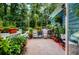 Charming deck featuring ample space, lush greenery, and seating, perfect for relaxation near the inviting backyard pool at 2910 Edwards Ct, Marietta, GA 30068