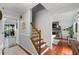 Inviting home entryway featuring hardwood floors and a staircase with wood banisters at 2910 Edwards Ct, Marietta, GA 30068