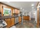 Well-appointed kitchen with wood cabinets, stainless steel appliances, and tiled flooring at 2910 Edwards Ct, Marietta, GA 30068