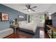 Relaxing main bedroom with hardwood floors, a ceiling fan, and plenty of natural light at 2910 Edwards Ct, Marietta, GA 30068
