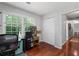 Office with hardwood floors, large window, closet, desk and chair at 2910 Edwards Ct, Marietta, GA 30068