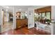 View from kitchen of bright sunroom filled with plants and natural light at 2910 Edwards Ct, Marietta, GA 30068